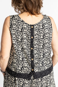 Betty wearing size L/XL Sahana Contrast Hem Sleeveless Top in Black Primrose floral print flowy boho sleeveless top