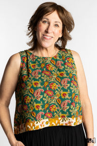 Betty wearing size L/XL Sahana Contrast Hem Sleeveless Top in Forest Green floral print flowy boho sleeveless top