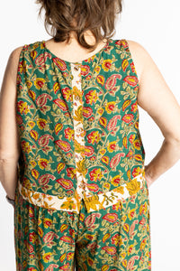 Betty wearing size L/XL Sahana Contrast Hem Sleeveless Top in Forest Green floral print flowy boho sleeveless top
