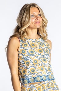 Sophie wearing size S/M Sahana Contrast Hem Sleeveless Top in Sunflower floral print flowy boho sleeveless top