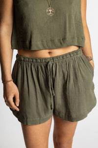 Sophie wearing Mel Milaana Cotton Drawstring Shorts in olive with matching olive Sahana Sleeveless Cotton Top, one size