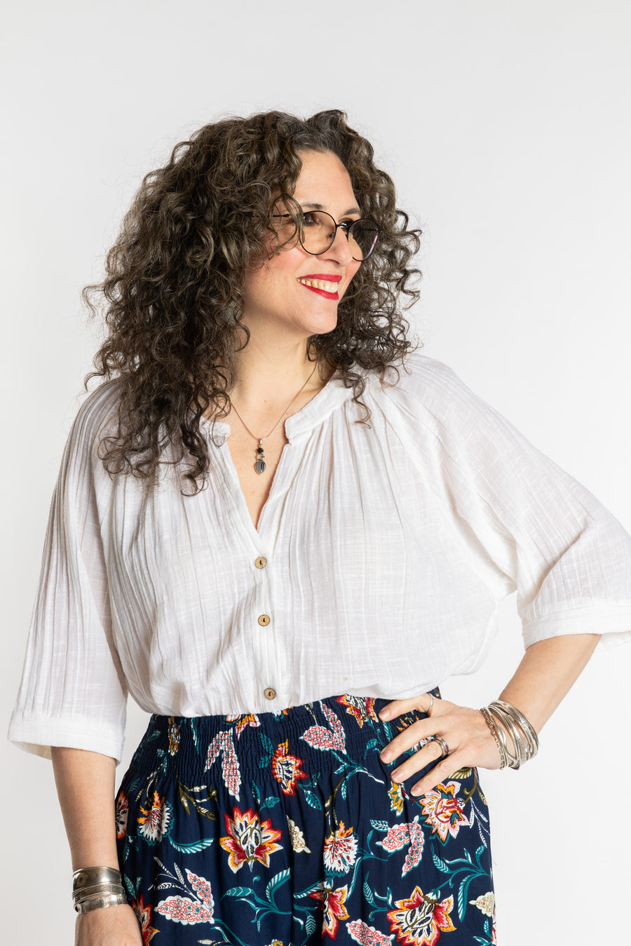 Susan is wearing the L/XL white flowy boho cotton top