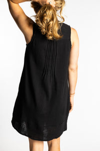 Sophie is wearing the S/M black lightweight cotton pleated dress sleeveless boho style