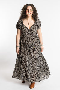 Susan is wearing the size M/L Black Amara Cotton Maxi Dress