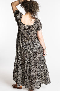 Susan is wearing the size M/L Black Amara Cotton Maxi Dress
