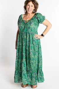 Betty is wearing the size M/L Green floral Amara Cotton Maxi Dress
