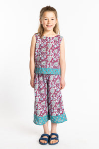 Louisa wearing the Sahana Contrast Hem Kids Top and Penny Lane Contrast Hem Kids Pants in burgundy floral print, size Small