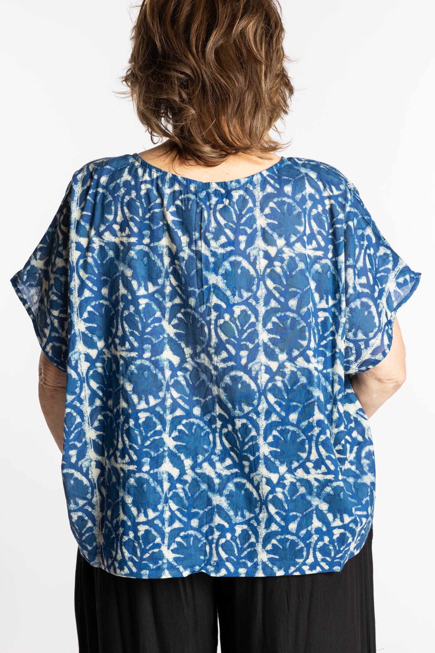 Betty is wearing the L/XL Blue floral Screen Printed Cotton Blouse