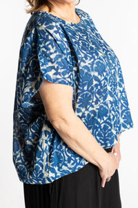 Betty is wearing the L/XL Blue floral Screen Printed Cotton Blouse
