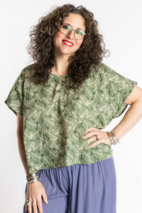 Susan is wearing the L/XL Fern green floral Screen Printed Cotton Blouse