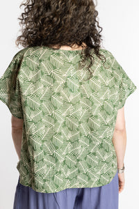 Susan is wearing the L/XL Fern green floral Screen Printed Cotton Blouse