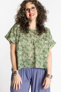 Susan is wearing the L/XL Fern green floral Screen Printed Cotton Blouse