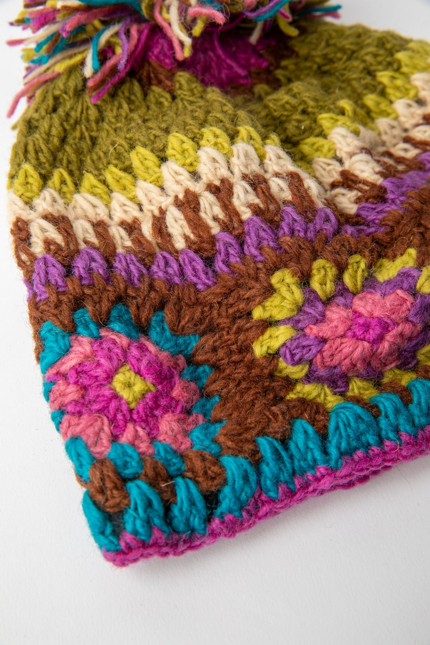 Granny Square Wool Pom Pom Hat in purple