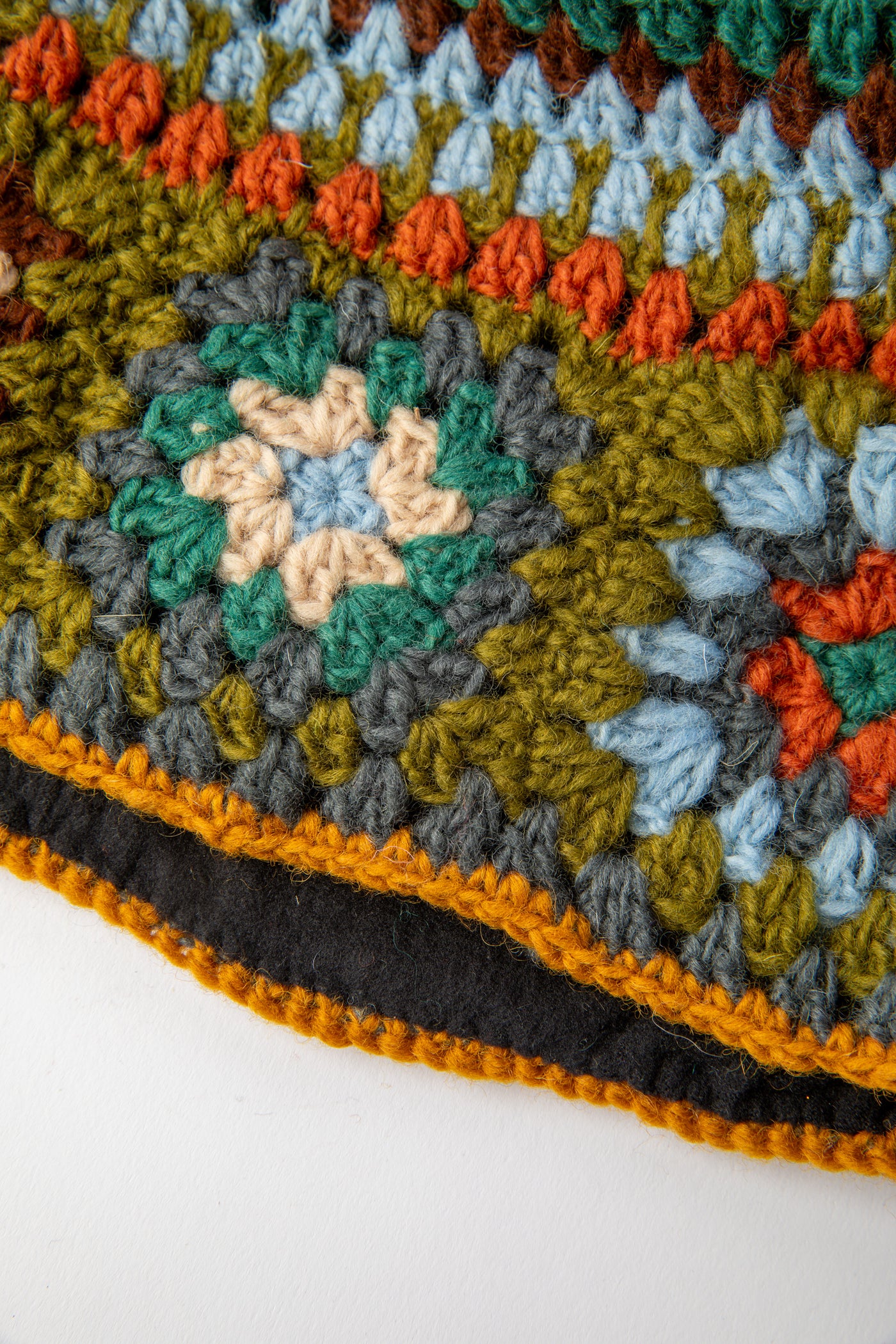 Granny Square Wool Pom Pom Hat in turquoise