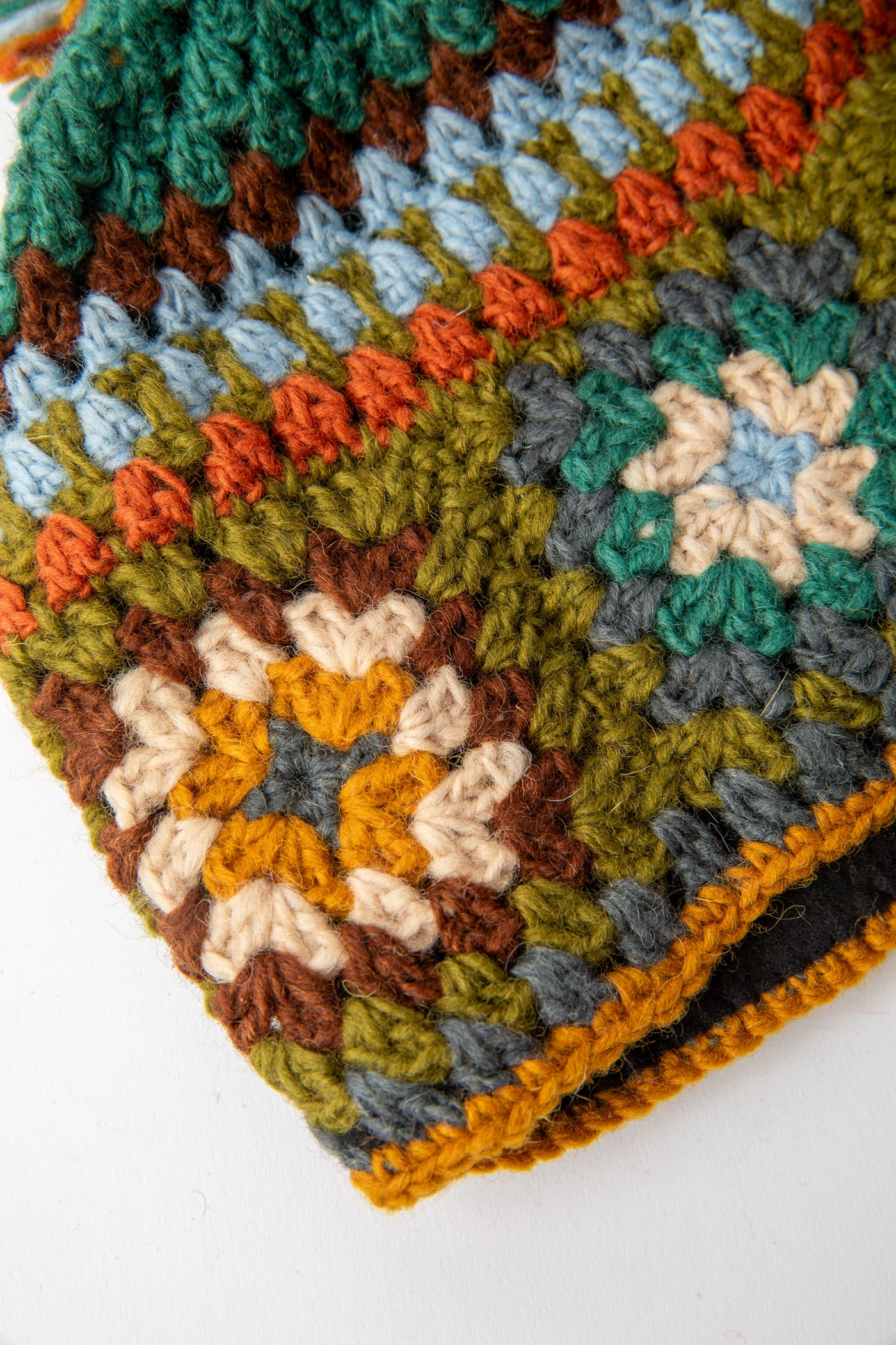 Granny Square Wool Pom Pom Hat in turquoise