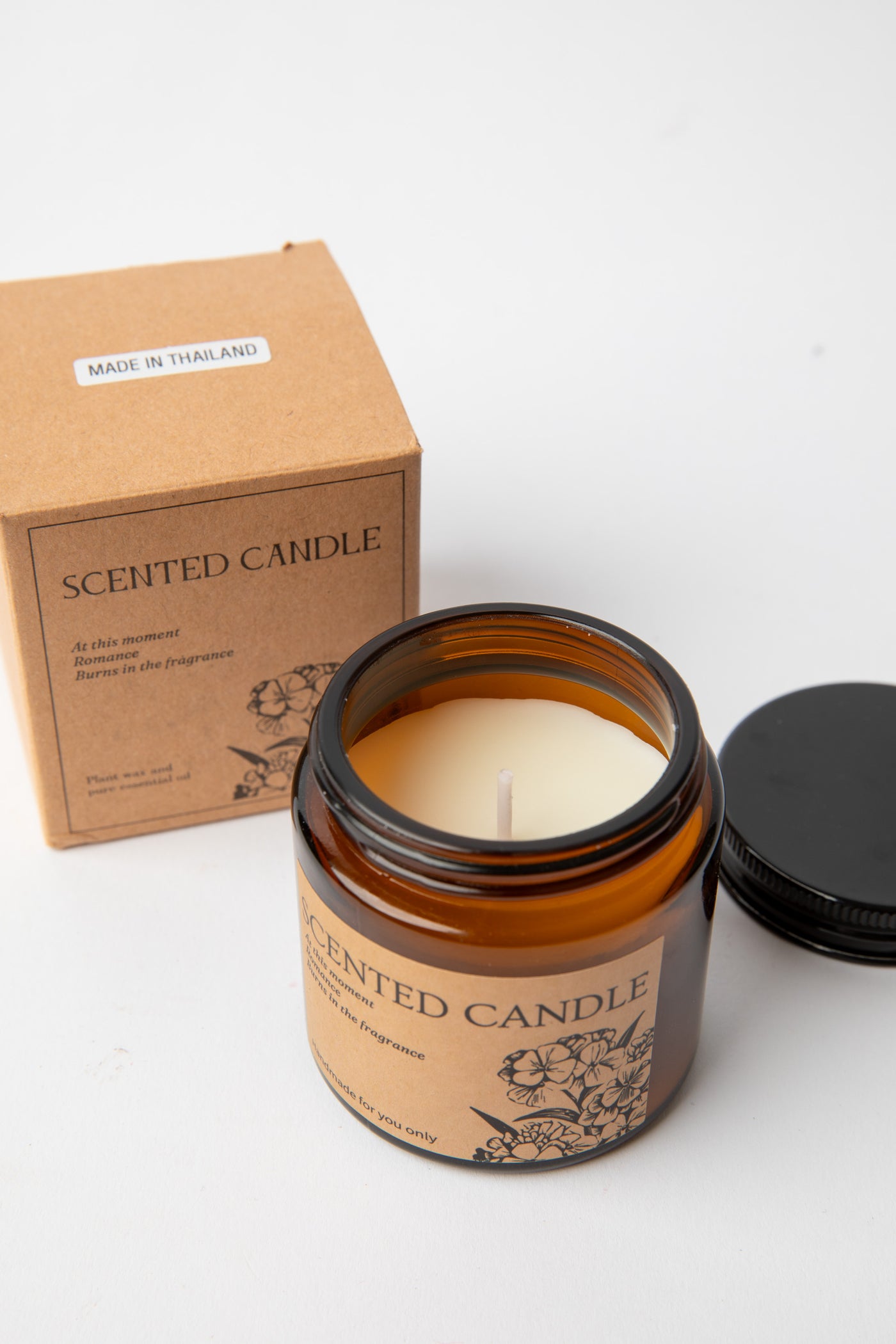Amber Apothecary Jar Candle with brown box packaging labeled Scented Candle