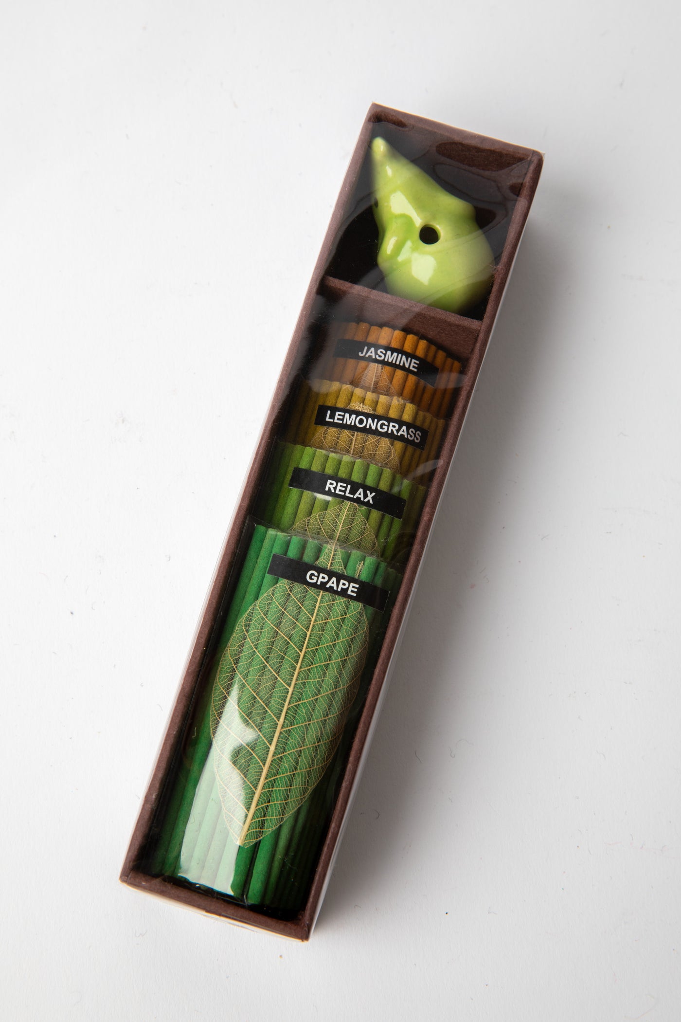 Green Elephant Incense Gift Set featuring ceramic holder and jasmine, lemongrass, and grape incense sticks