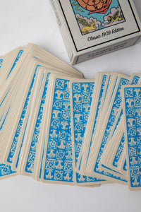 Fan of Classic 1909 Tarot Deck cards showing intricate Pamela Colman Smith illustrations and vibrant vintage colors