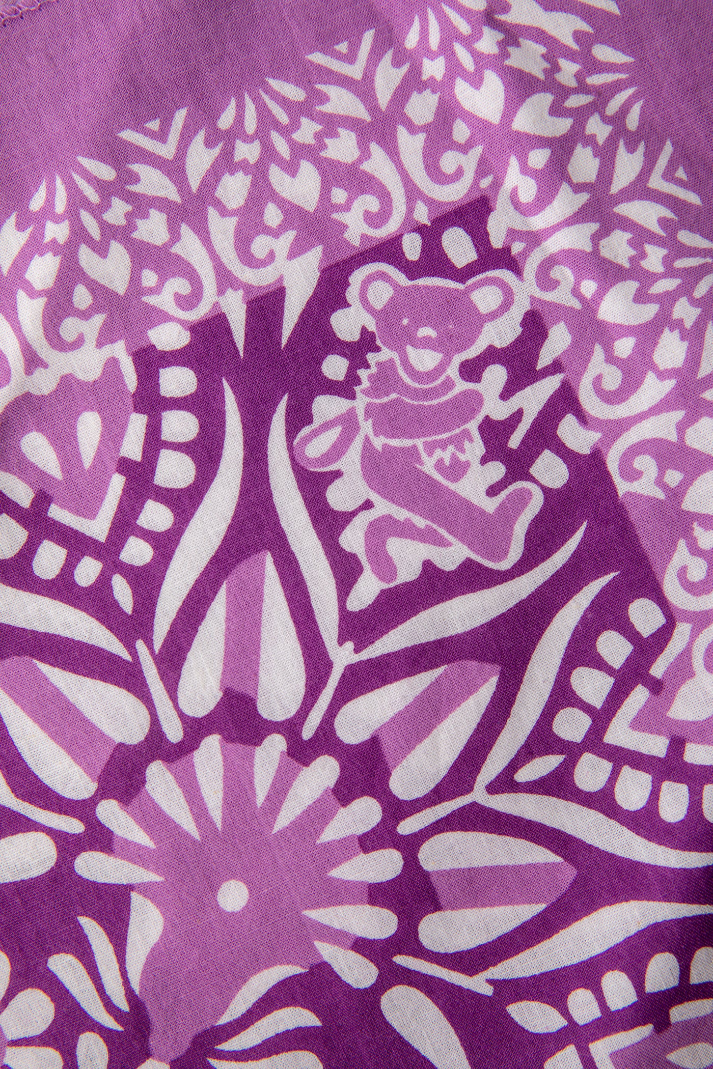 Close-up of purple Mandala Bears Grateful Dead Bandana with light pink Dancing Bears and floral mandala print