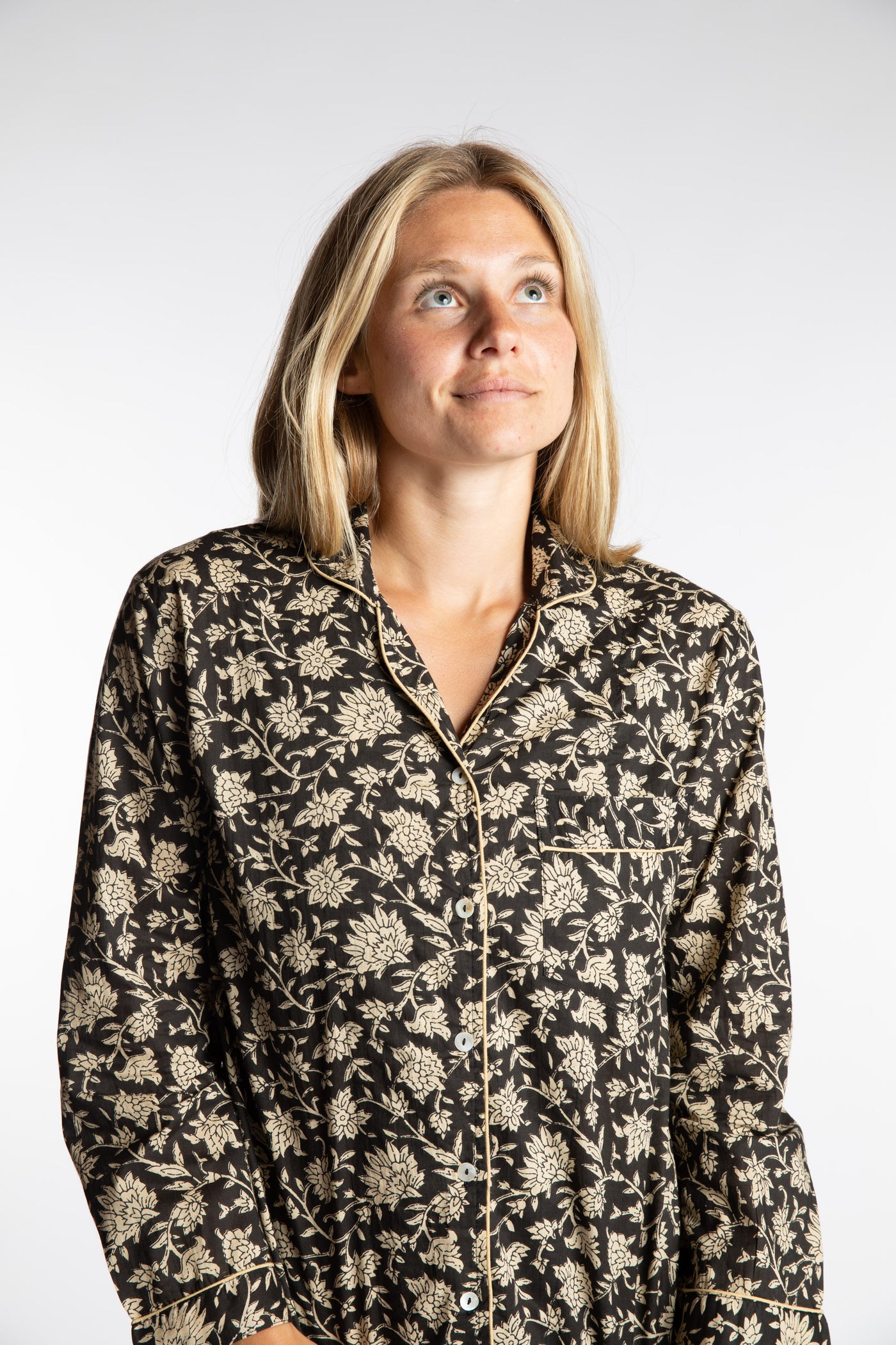 Sophie is wearing the Black floral Jaipur Printed Pajama Set in S/M