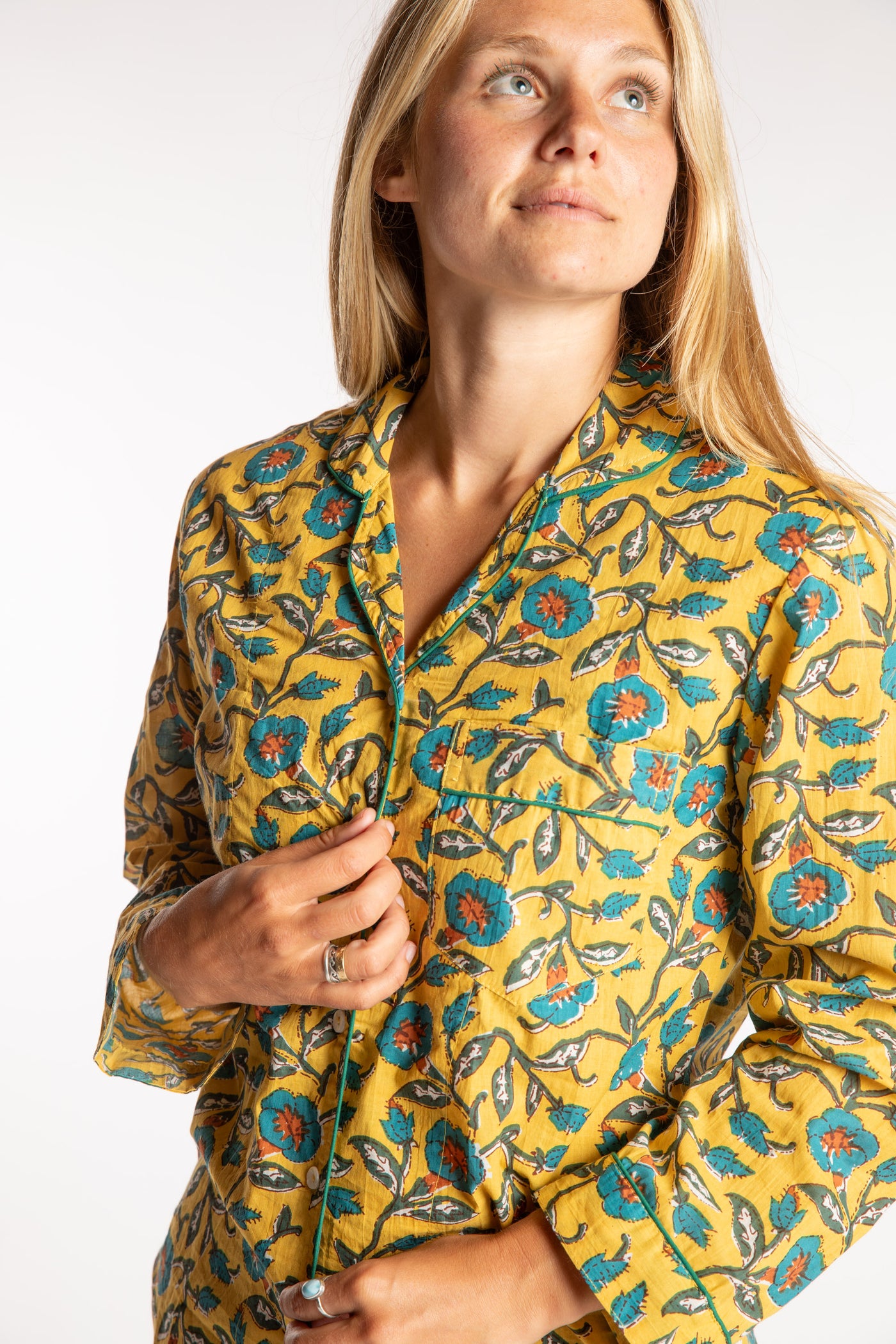 Sophie is wearing the yellow floral Morning Glory Jaipur Printed Pajama Set in S/M