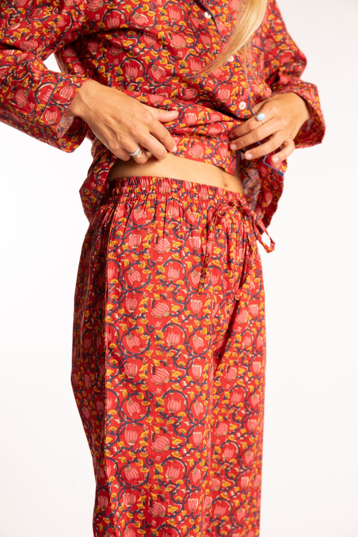Sophie is wearing the red floral Pomegranate Jaipur Printed Pajama Set in S/M