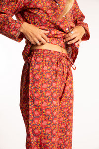 Sophie is wearing the red floral Pomegranate Jaipur Printed Pajama Set in S/M