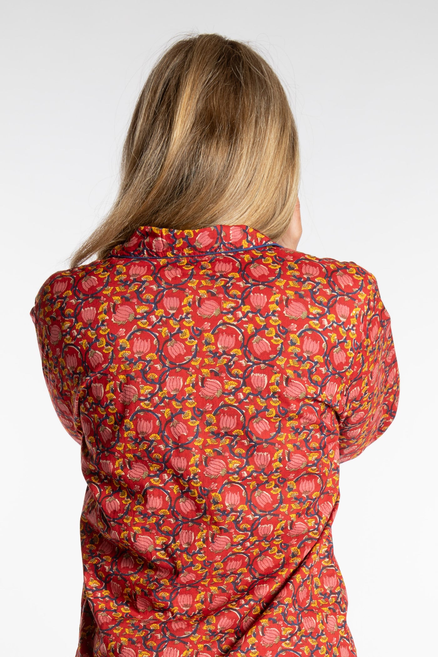 Sophie is wearing the red floral Pomegranate Jaipur Printed Pajama Set in S/M