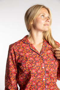 Sophie is wearing the red floral Pomegranate Jaipur Printed Pajama Set in S/M