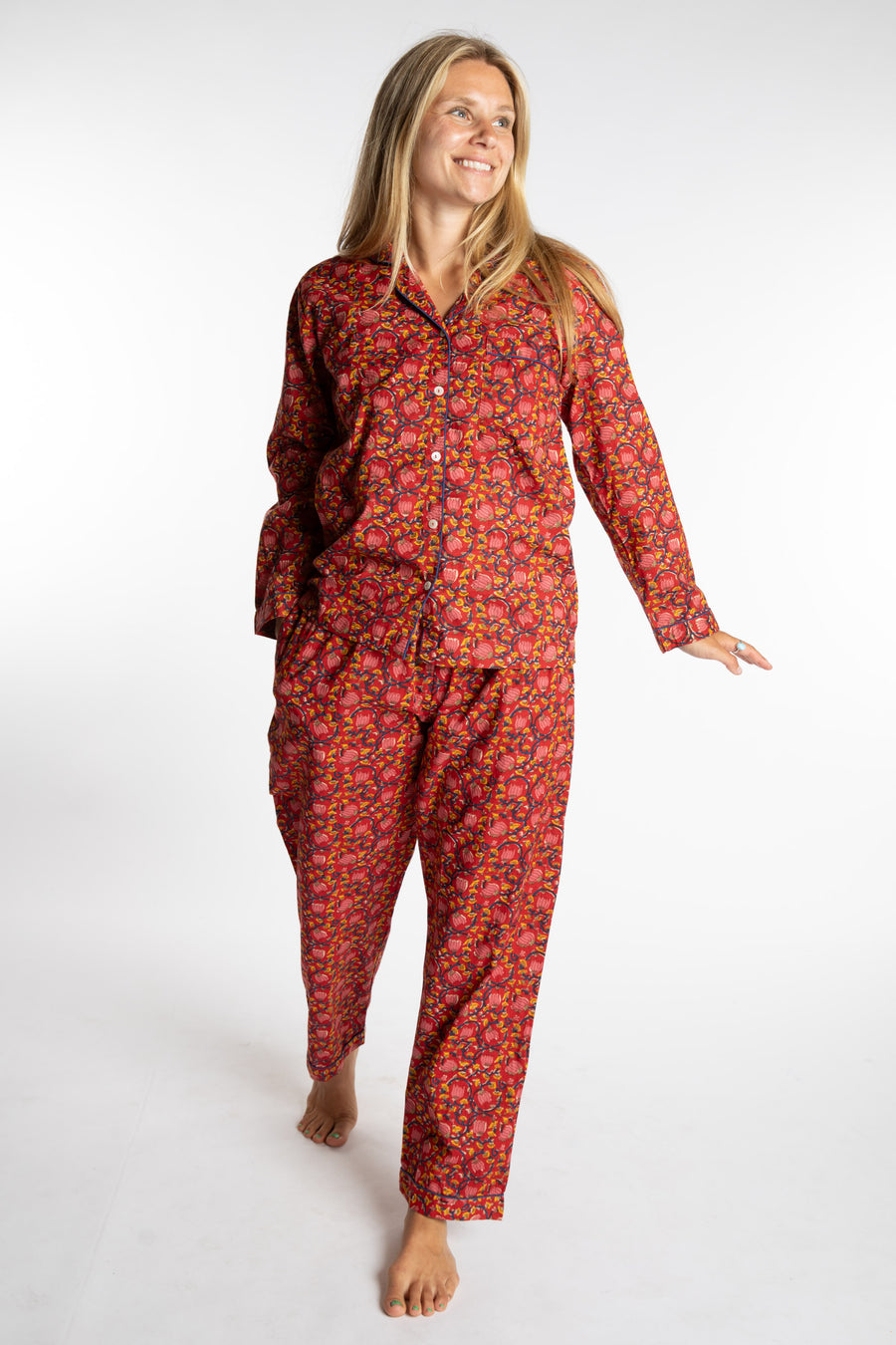 Sophie is wearing the red floral Pomegranate Jaipur Printed Pajama Set in S/M