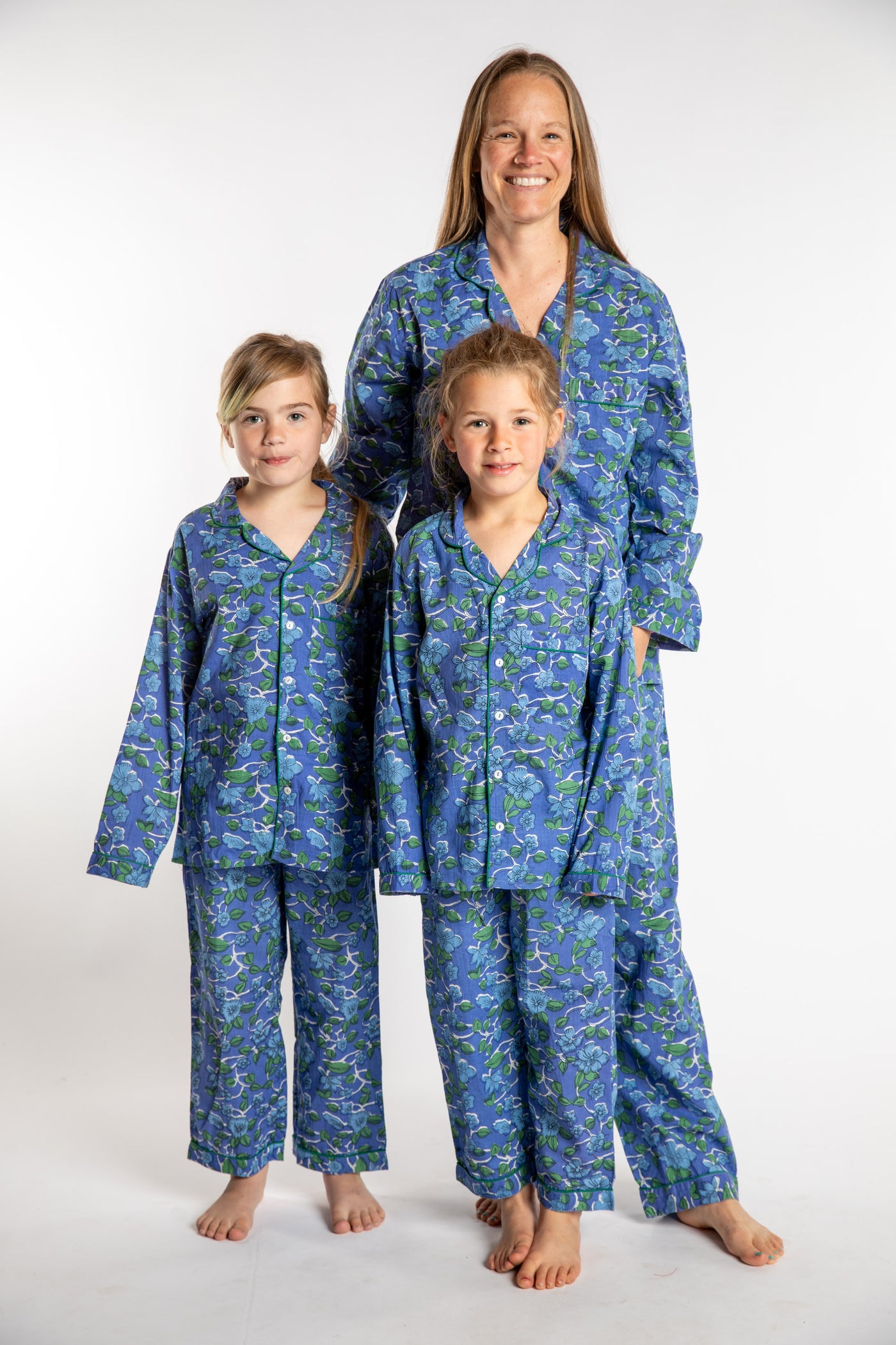 Louisa, age 7 in size 4/5. Edie, age 10 in size 6/7. Abby wearing size S. Blue Blooms Pajama Set