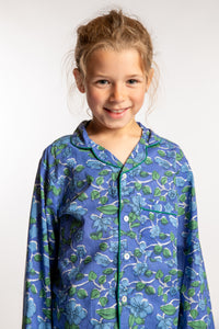 Louisa, age 7, wearing the size 4/5 Kids Jaipur Printed Pajama Set in Blue Blooms