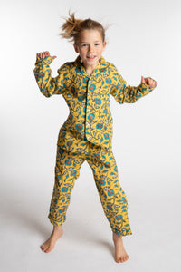 Louisa, age 7, wearing the size 4/5 Kids Jaipur Printed Pajama Set in Yellow Floral Morning Glory