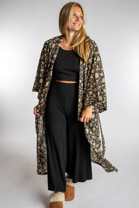 Sophie is wearing the Black floral Jaipur Printed Robe