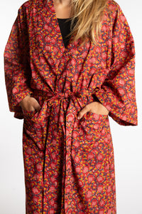 Sophie is wearing the red floral Pomegranate Jaipur Printed Robe