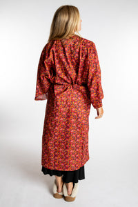Sophie is wearing the red floral Pomegranate Jaipur Printed Robe