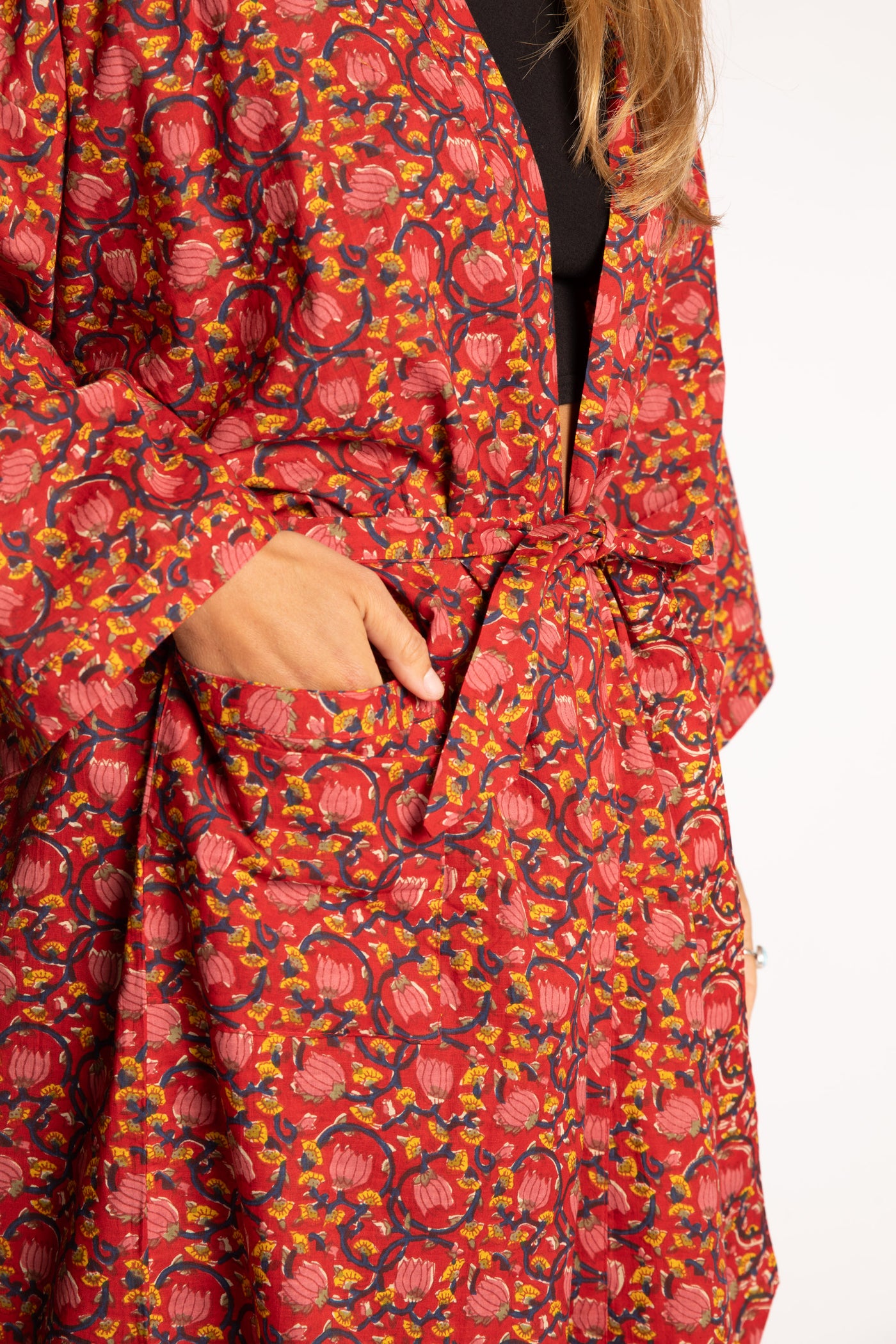 Sophie is wearing the red floral Pomegranate Jaipur Printed Robe