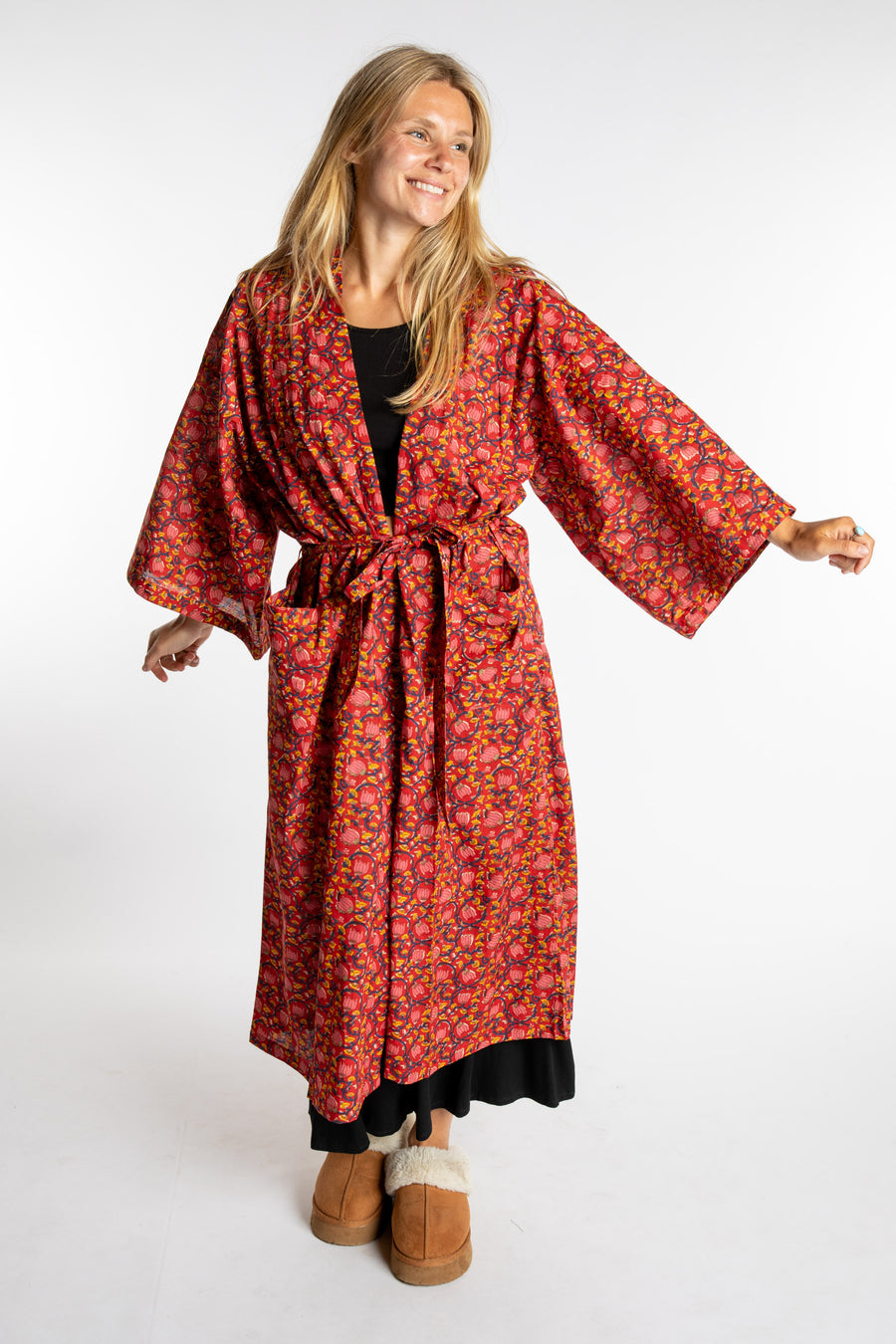 Sophie is wearing the red floral Pomegranate Jaipur Printed Robe