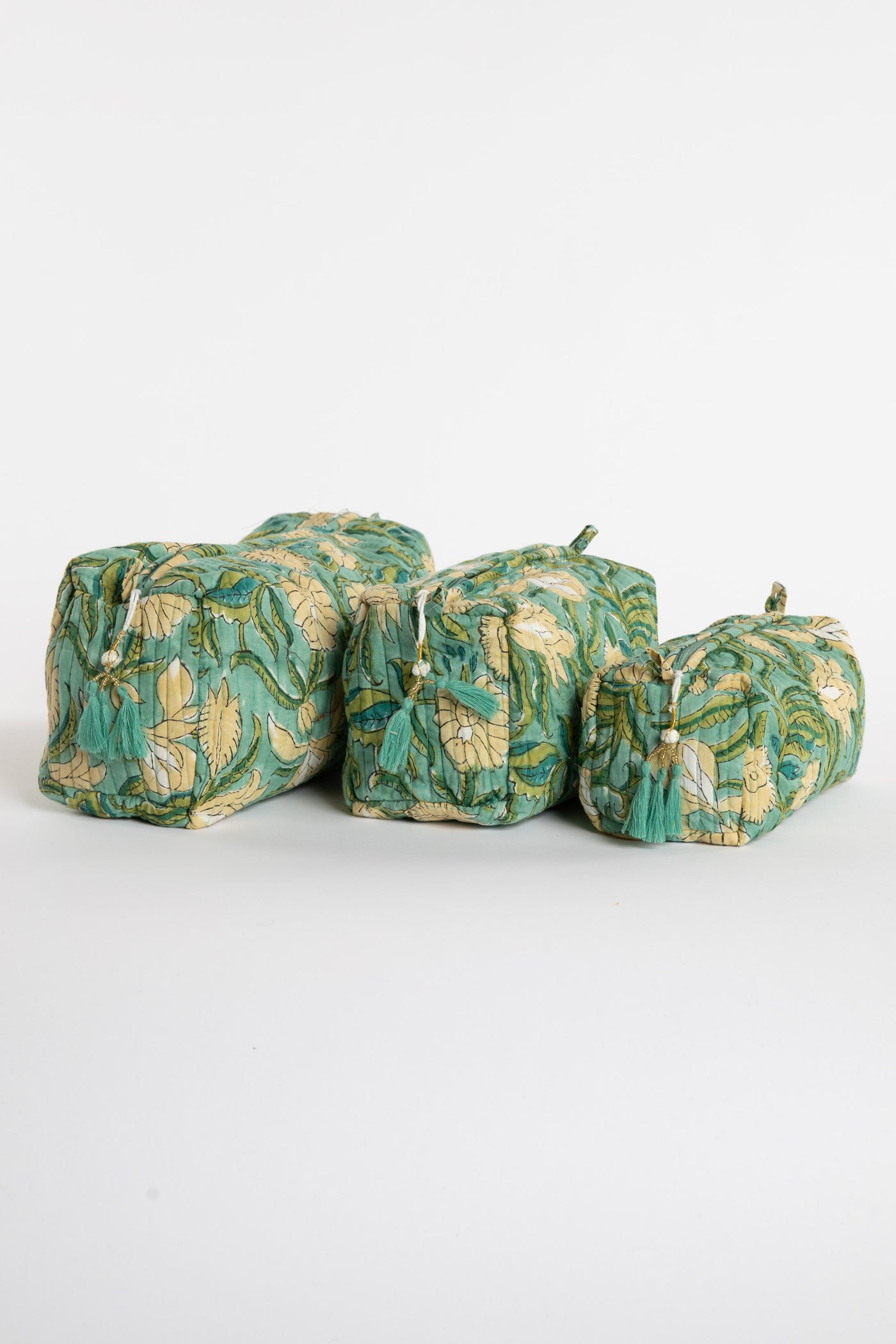 Quilted block print bag in green Aquamarine floral. Available in 3 sizes.