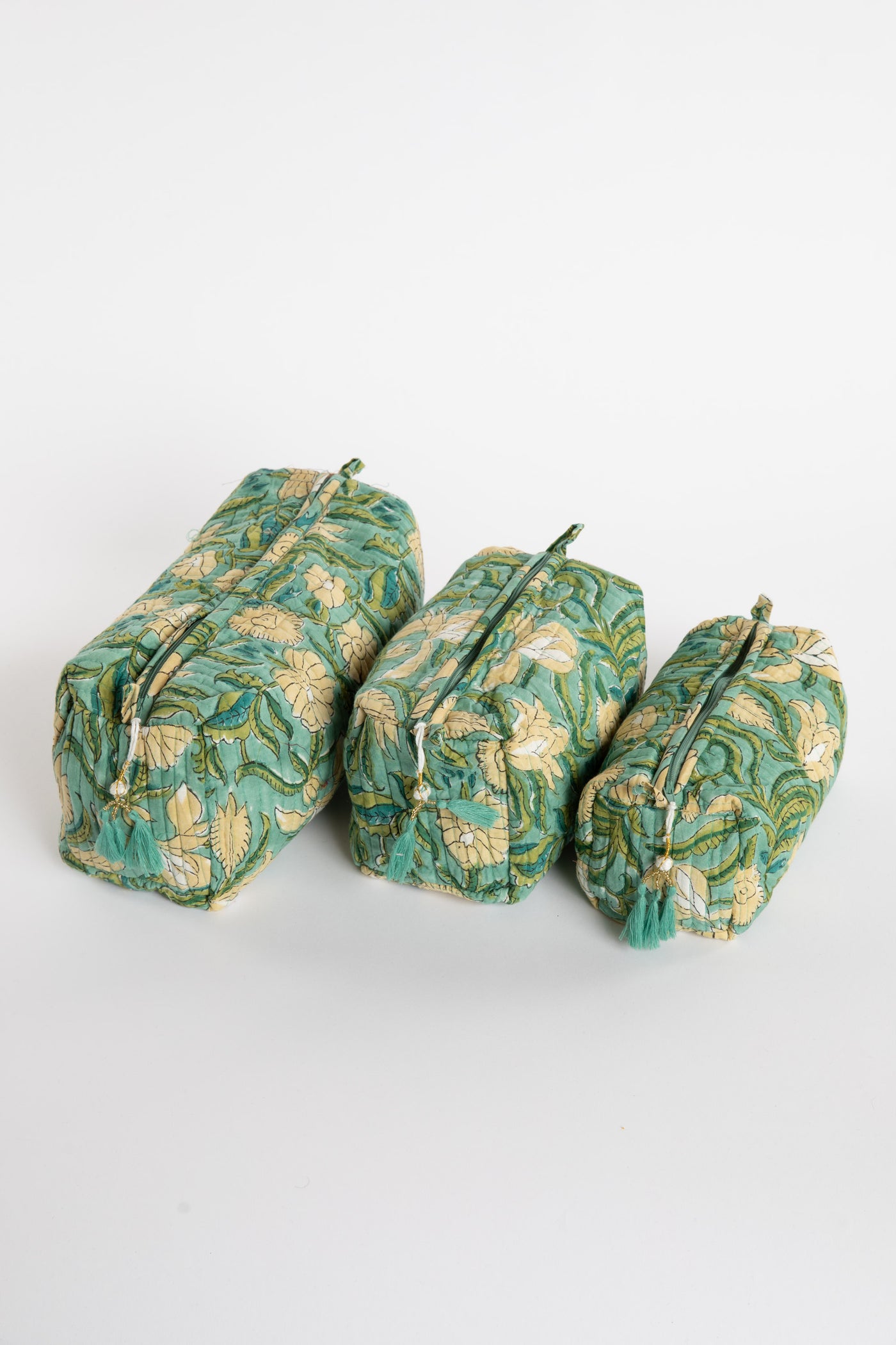 Quilted block print bag in green Aquamarine floral. Available in 3 sizes.