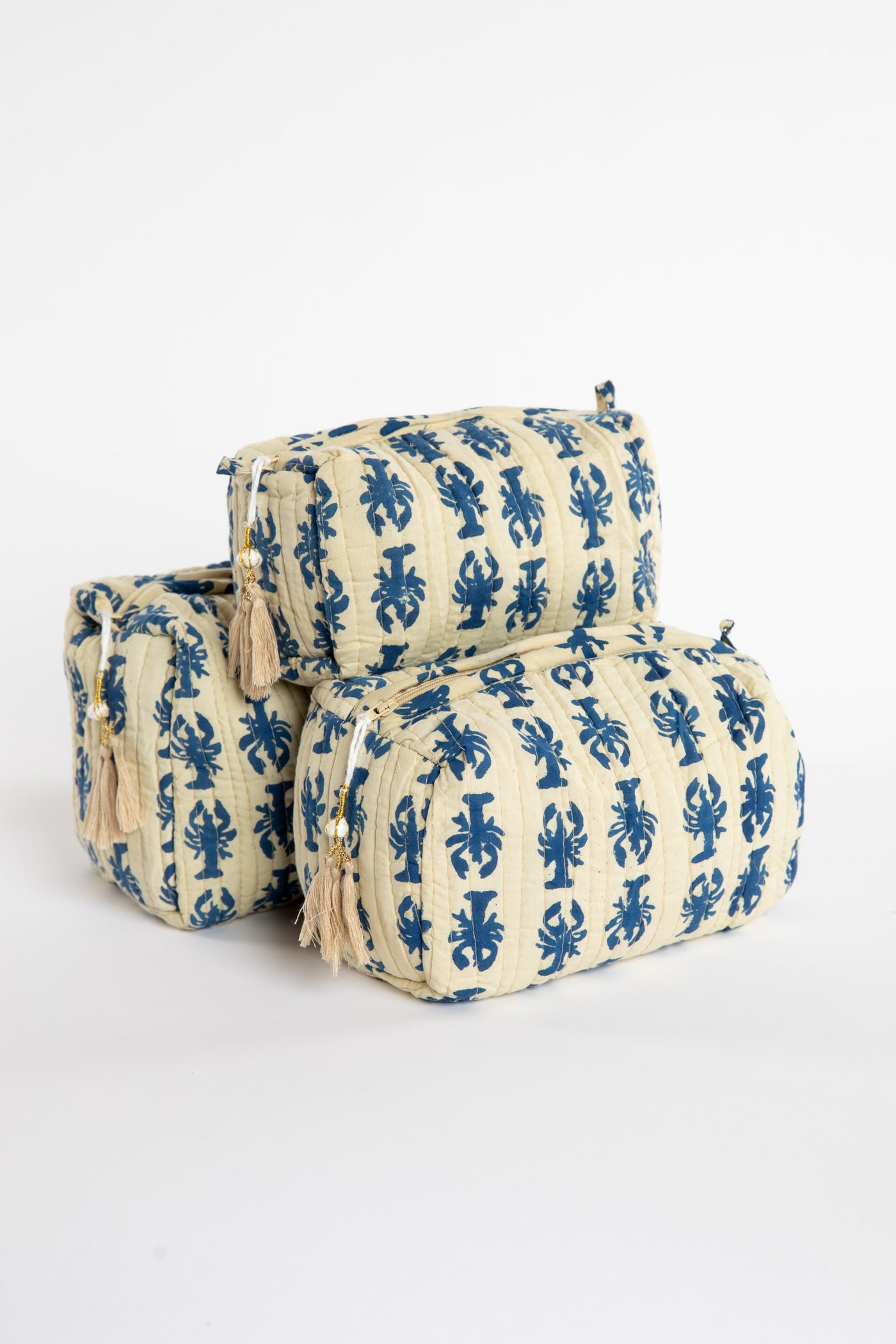 Quilted block print bag in blue lobster. Available in 3 sizes.