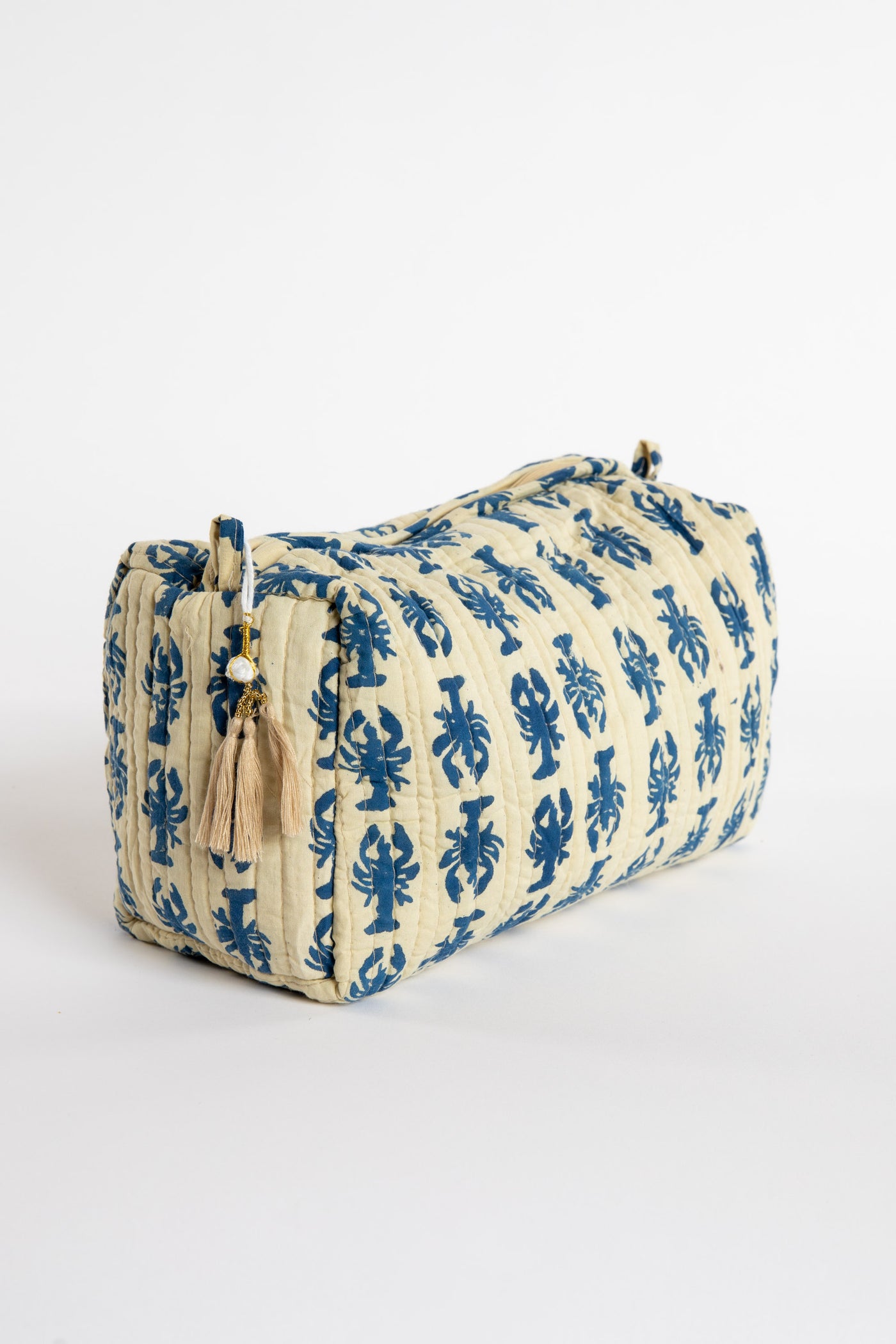 Quilted block print bag in blue lobster. Available in 3 sizes.