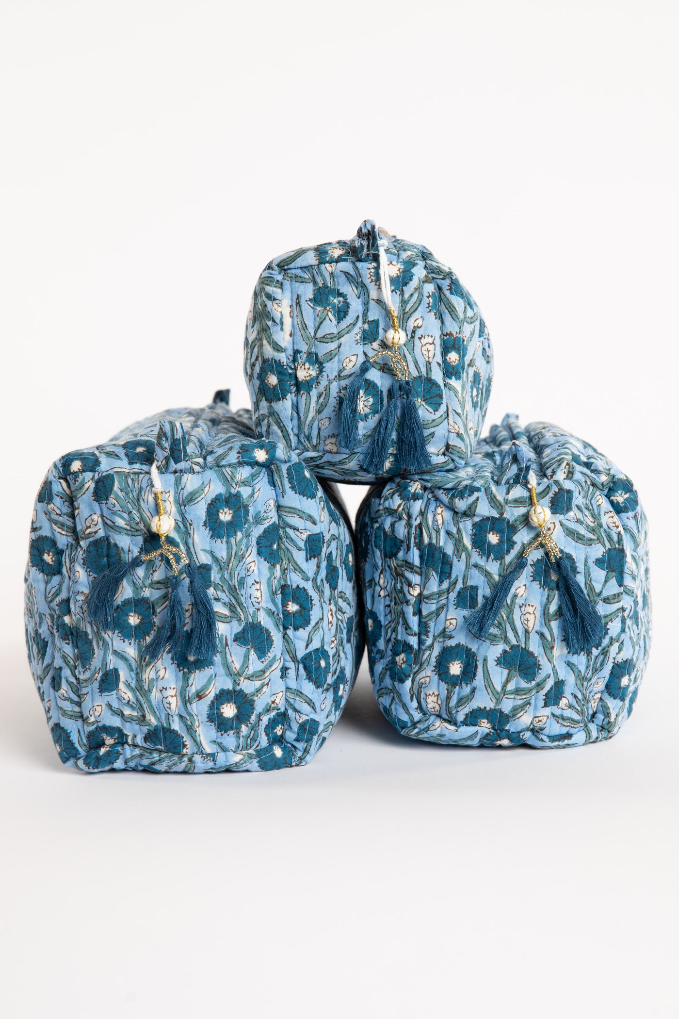 Quilted block print bag in blue mist floral. Available in 3 sizes.