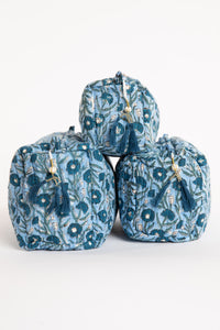Quilted block print bag in blue mist floral. Available in 3 sizes.