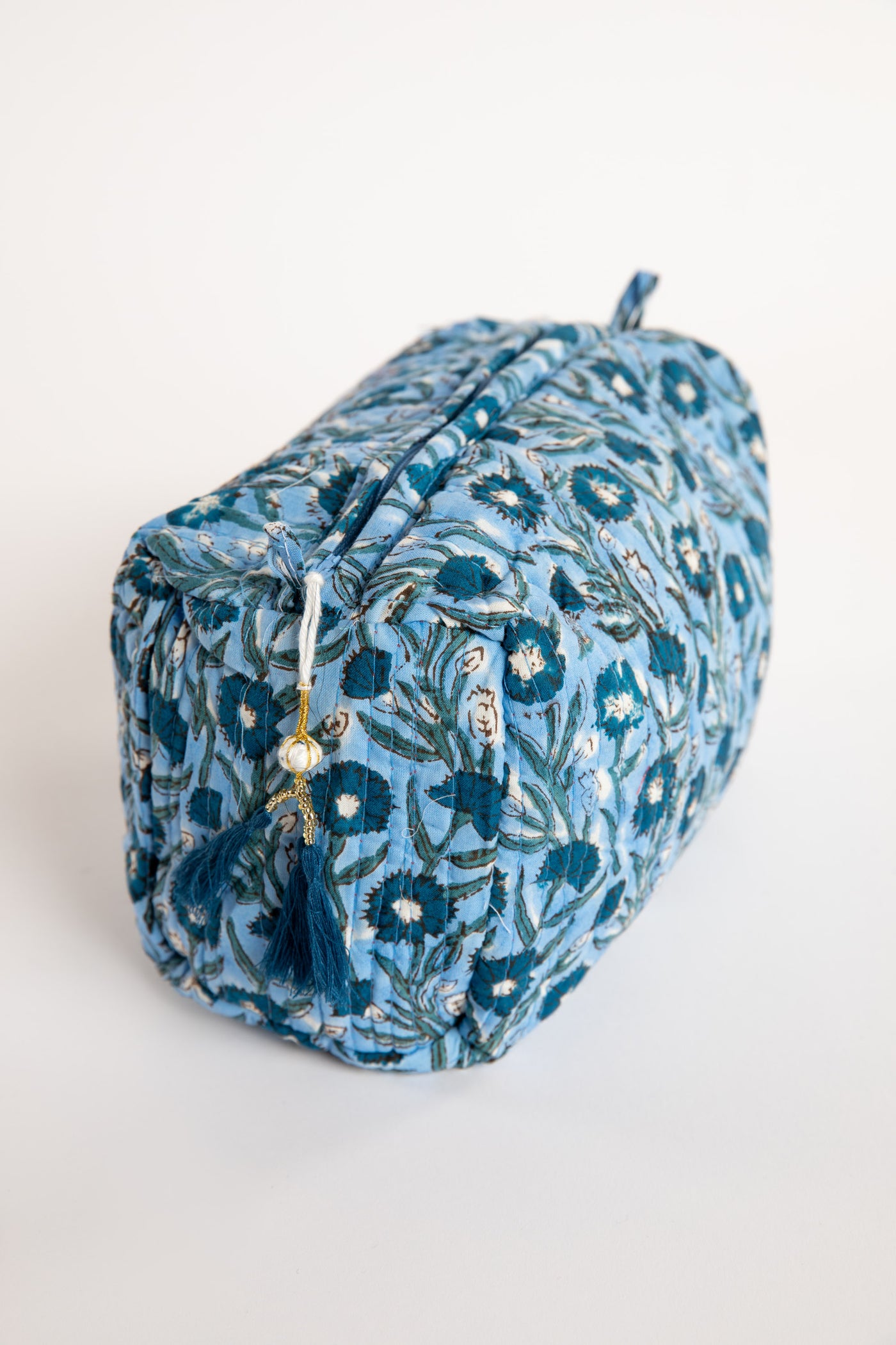 Quilted block print bag in blue mist floral. Available in 3 sizes.