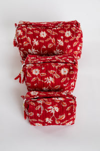 Quilted block print bag in red Garnet floral. Available in 3 sizes.