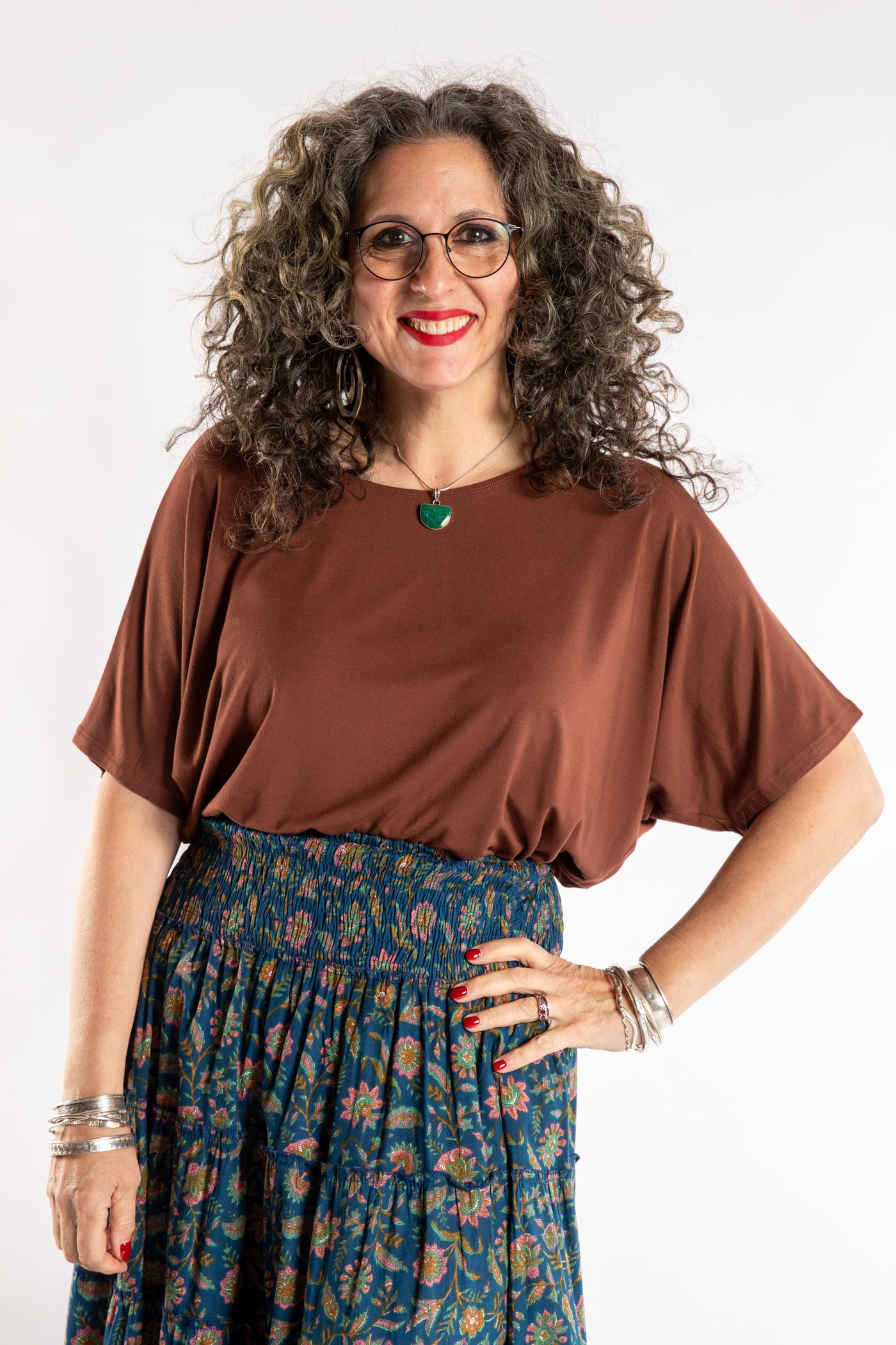 Susan is wearing the Allie Dolman in Brown in L/XL
