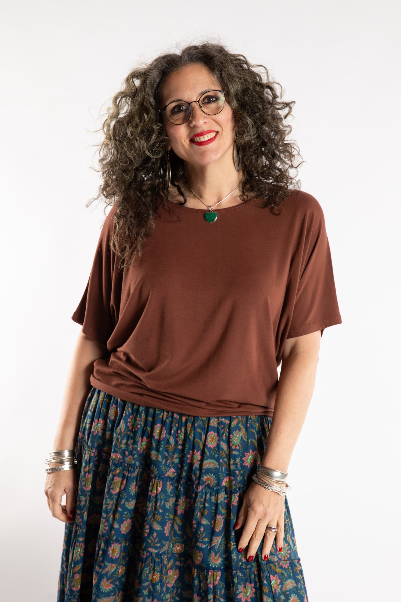 Susan is wearing the Allie Dolman in Brown in L/XL