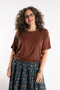 Susan is wearing the Allie Dolman in Brown in L/XL