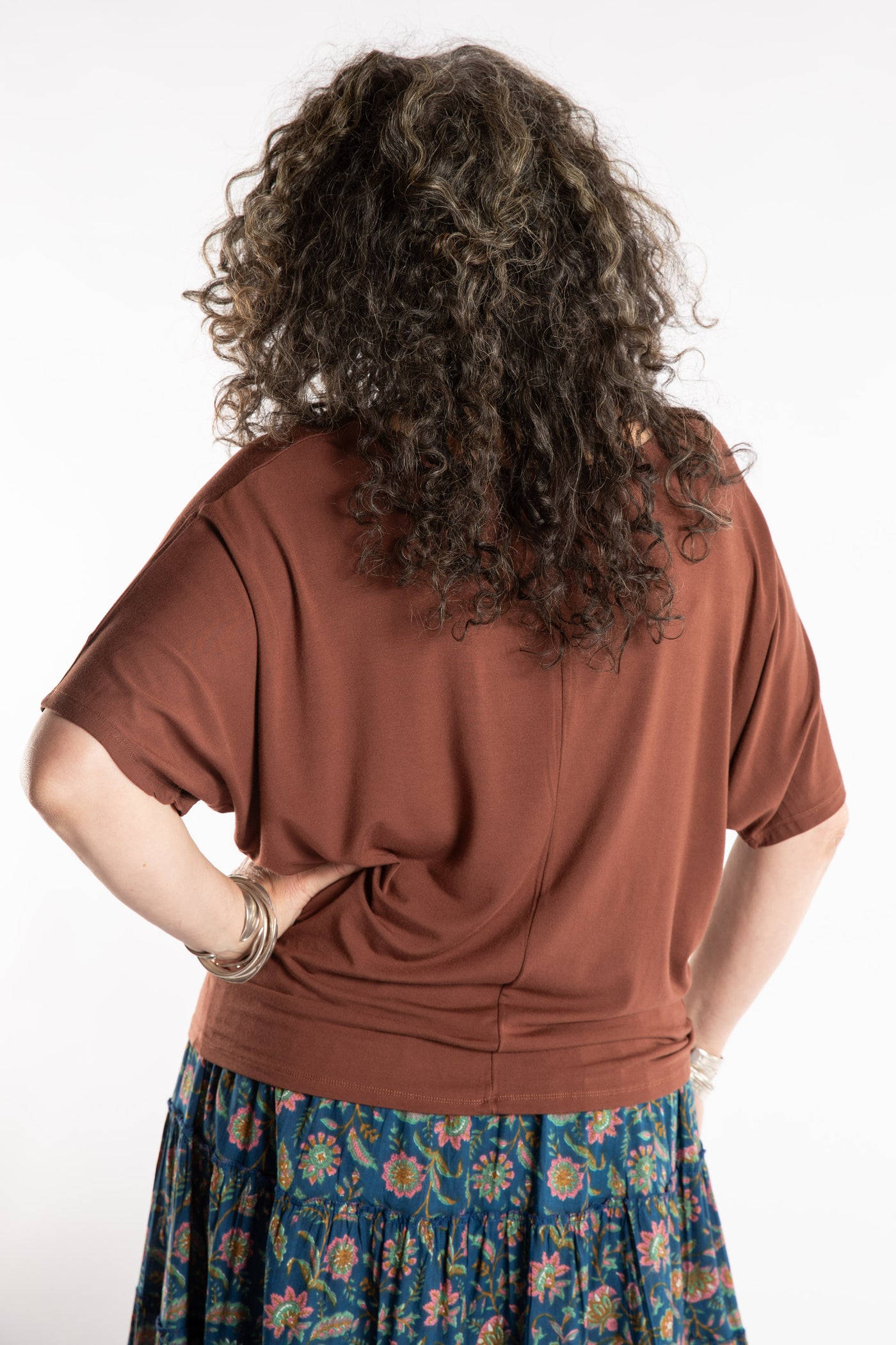 Susan is wearing the Allie Dolman in Brown in L/XL